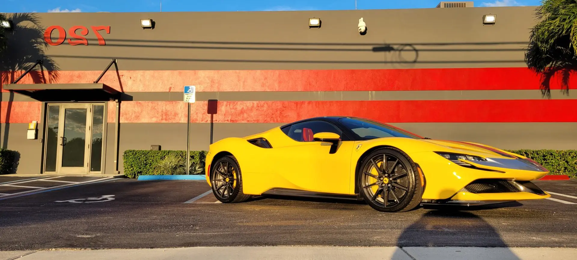 Yellow Ferrari SF90 at the Advanced Detailing Sofla studio in Pompano Beach