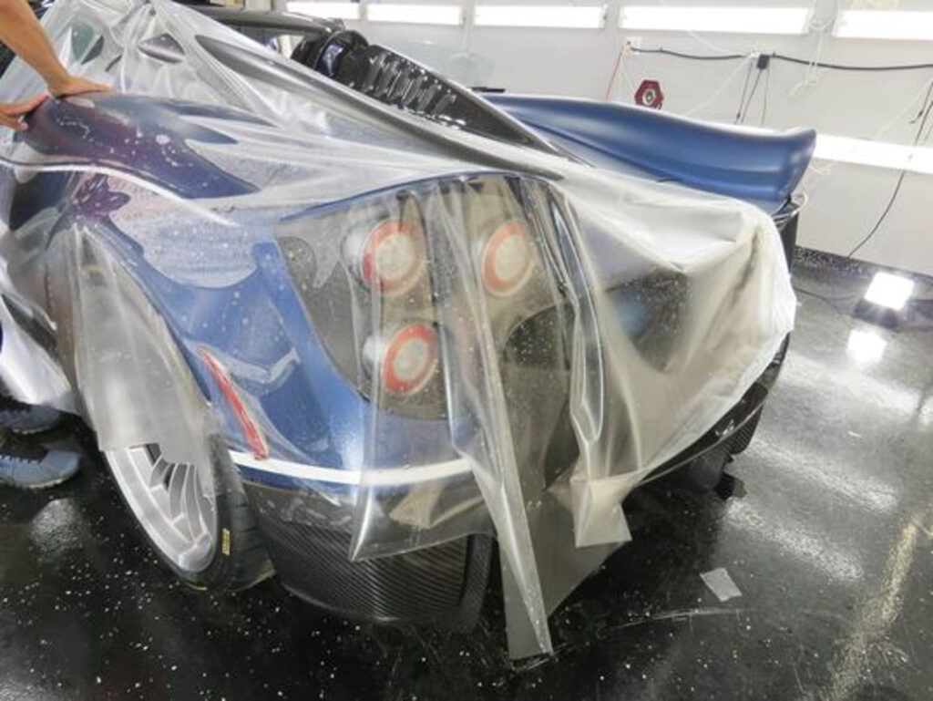 blue car tail applying paint protection film Advanced Detailing Sofla Pompano Beach FL